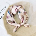Elegant silk scarf featuring colorful feather patterns on a light beige background - Pink Feather