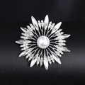 Elegant silver flower brooch with central pearl and sparkling crystal petals on dark background - BR1177-5 Silver Base White