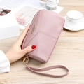 Pink lychee texture leather clutch wallet with gold metal logo and wrist strap detail - Light Pink