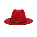 Close-up of a red wool fedora featuring a braided brown band and gold feather charm - Red