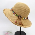 Straw sun hat with colorful beads, seashells, and frayed edges in natural wood color - M Adult (56-58cm) / Khaki