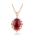 Collana in oro rosa con un grande rubino rosso ovale e accenti di diamanti scintillanti - Ciondolo