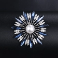Elegant silver flower brooch featuring deep blue crystals and a central white pearl - BR1177-2 White Base Blue