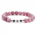 Handmade beaded bracelet featuring pink natural stones and white beads spelling MOM - MOM (MB21-0245)