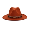 Detail of caramel fedora hat featuring woven band with golden feather and beaded accents - Caramel color