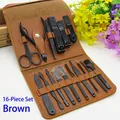 Detail of 16-piece black stainless steel manicure set in a brown leather travel case - 16-Piece Set Brown (Upgraded)