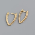 Detailed close-up of V-shaped gold earrings with sparkling pavé cubic zirconia inlay - 925 Silver / Gold Color (Pair)