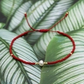 Handmade red beaded bracelet with natural pearl and adjustable woven bohemian cord - Red