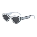 Retro cat-eye sunglasses with pearl white frame and bold black border accents - Solid White Frame Grey Lens