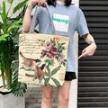 Ethnic style canvas tote bag with retro floral bird pattern and black stripe handles - Two Great Tits