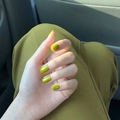 Close-up of long rounded avocado green glossy press-on nails with shiny finish - Liquid Glue Style (JP771)