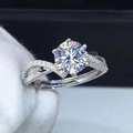 Elegant silver zircon ring featuring six-prong round stone and twisted micro-paved band - US 6 / White Gold