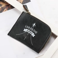 Compact black PU leather zipper coin purse with Live In The Moment slogan print - Black