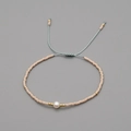 Handmade pink beaded bracelet with white pearl and adjustable light blue cord - Flesh Pink
