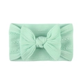 Soft jacquard nylon baby headband with large mint green bow and stretchy knit pattern - Mint Green