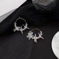 Detail of white matte flower earrings with clear beads and gold hooks on dark surface - E2859-8/Steel Pin Gold Ring Flower