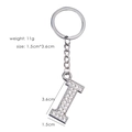 Detailed view of silver letter I keychain with sparkling rhinestones and measurements - Letter I