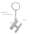 Detail of silver letter H keychain with sparkling rhinestones and product measurements - Letter H