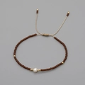 Bohemian handmade adjustable bracelet with brown matte beads and central natural pearl - Dark Brown
