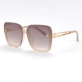 Chic women's square sunglasses with champagne gradient lenses and golden clover detail - Transparent Tea Frame Gradient Tea Lens