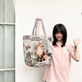 Ethnic style canvas tote bag featuring a fox and Tower Bridge design with top handles - Fox