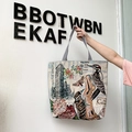 Ethnic style woven canvas tote bag featuring vintage floral and building patterns - Flatiron Building 1902