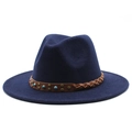 Detail of navy fedora hat featuring woven leather band with turquoise beads and studs - Navy Blue