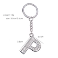 Detailed size view of silver metal letter P keychain with sparkling rhinestones inlay - Letter P