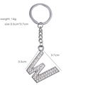 Detail view of rhinestone letter W keychain with 14g weight and 3.5cm x 3.7cm size - Letter W