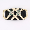 Detail of magic hair comb with beige wooden beads, tree of life metal décor and green rhinestones - Tree Wood (Rice White)