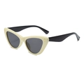 Lunettes de soleil œil de chat rétro avec monture crème, branches noires et détails dorés - Monture Blanc Cassé Branches Noires Verres Gris