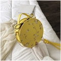 Yellow round crossbody bag with white floral embroidery and black edge detailing - Round / Yellow