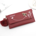 Elegant deep red long flap wallet with butterfly metal buckle and soft fur ball charm - Red