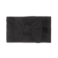 Detailed close-up of a black jacquard nylon baby headband with a large knit bow detail - Black