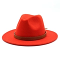 Detail of red fedora hat featuring a brown snakeskin pattern band on smooth wool felt - Orange Red