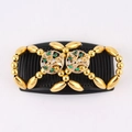 Close-up of double hair comb with tree of life design and green rhinestones detail - Tree Gold
