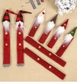 Detail of Christmas forest gnome microwave handle covers with red plaid and snowflake patterns - Gnome 8-Piece Set (J-JY42)