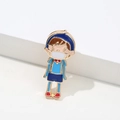 Cartoon boy enamel pin with blue outfit and white mask in a gold-plated finish - Blue Boy with Mask