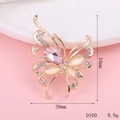Detailed view of butterfly alloy accessory with pink crystal and yellow cat eye stone - D100 Teardrop Butterfly (Pink)