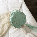 Mint green round crossbody bag with white floral embroidery and gold chain strap - Round / Green