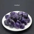 Natural deep purple amethyst raw stone crystals displayed on a white ceramic plate - Deep Amethyst