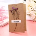 Close-up of dried purple baby's breath flowers on a kraft paper greeting card - Purple Gypsophila - Kraft Card