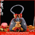Grey felt Christmas gift bag with a 3D reindeer design and festive golden bells - Plaid Bell Drawstring Bag Reindeer