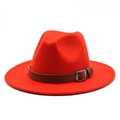 Detail of red wool fedora hat featuring wide brim and brown leather belt with metal buckle - Orange Red