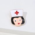 Cute cartoon nurse enamel pin featuring a white medical hat and gold finish trim - Nurse Avatar