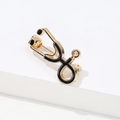 Medical gold-plated stethoscope brooch with black enamel inlay and pin fastener - Black Gold Stethoscope