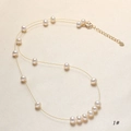 Detail view of freshwater pearl necklace with golden chain and adjustable lobster clasp - White Style (1#)