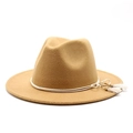 Close-up of camel wool fedora hat featuring white rope and fringe with gold beads - Camel