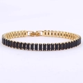 Elegant gold plated tennis bracelet featuring row of black rectangular cubic zirconia - Square Clasp Gold-Black
