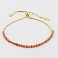 Detail of gold-plated box chain bracelet with adjustable sliding clasp and red zircons - Orange Zircon 2.5mm Bracelet